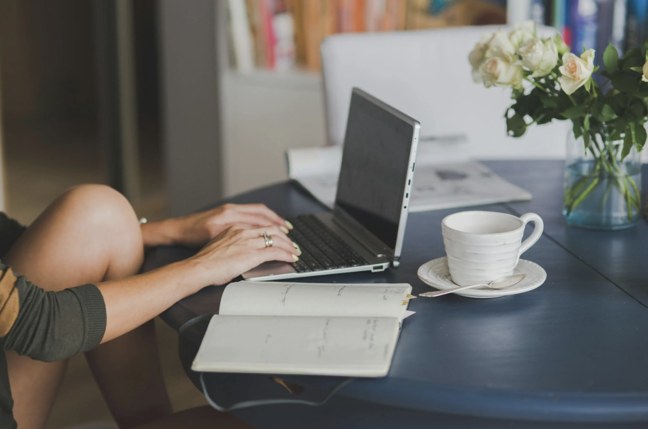 woman working on latptop at vacation rental